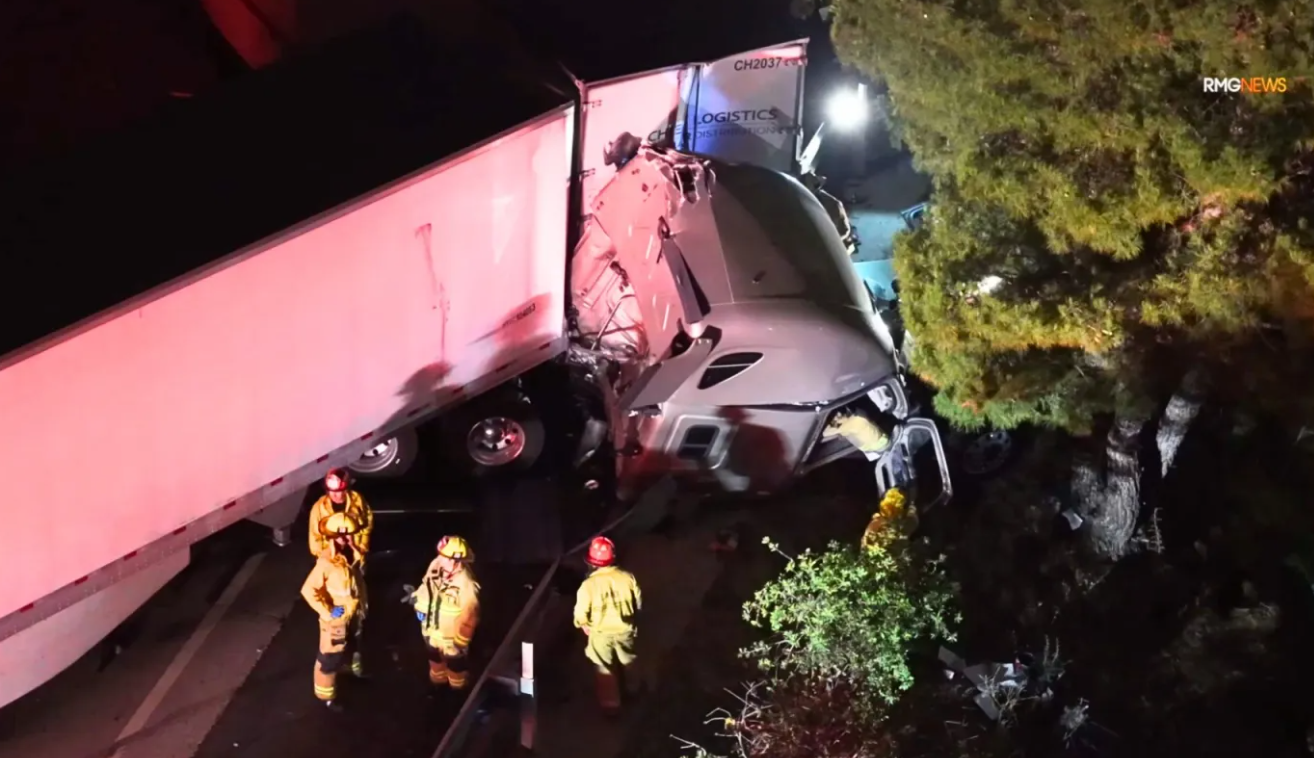 Sylmar crash leaves big rig dangling, closes eastbound 210 Freeway